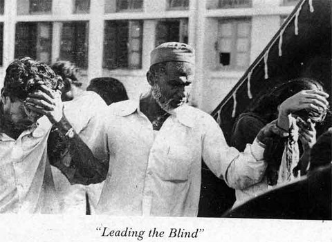 Bhopal 1984 A man leading a blinded couple